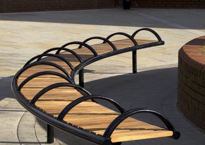 Shoreline SL007 bench. Made from Iroko timber and Powder coated finish. From our Shoreline street furniture range