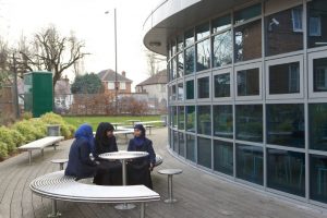benchmark design limited CL007 stainless steel table and stool, used in school and as street furniture