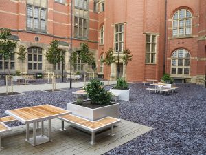 benchmark street furniture campus range. Iroko and aluminium benches