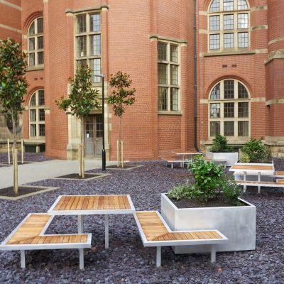 Campus arrangement of aluminium planter and Iroko benches Co-ordinated furniture