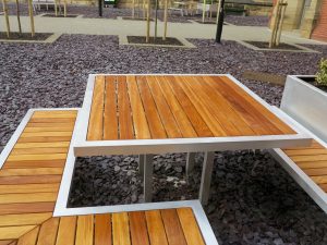 Campus street furniture table. Aluminium and Iroko hard wood table