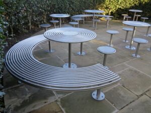 Centerline outdoor stools and table from benchmark street furniture