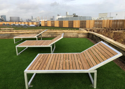 External sun lounger, manufactured in stainless steel with hardwood.